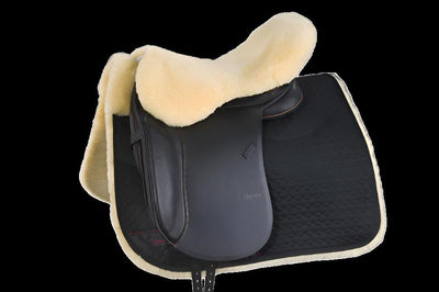 Example of sheepskin Seat cover / Saver on saddle with sheepskin pad- Horsedream Importers